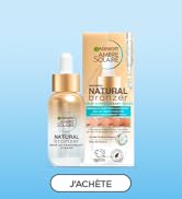 Le texte indique « FACHETÉ » et « NATUREL ». Image du produit montrant des flacons de soins de la peau ou de cosmétiques avec des bouchons dorés sur fond bleu clair.